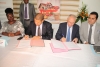 Jean Louis Billon et Yasser Ezzedine, signant la convention